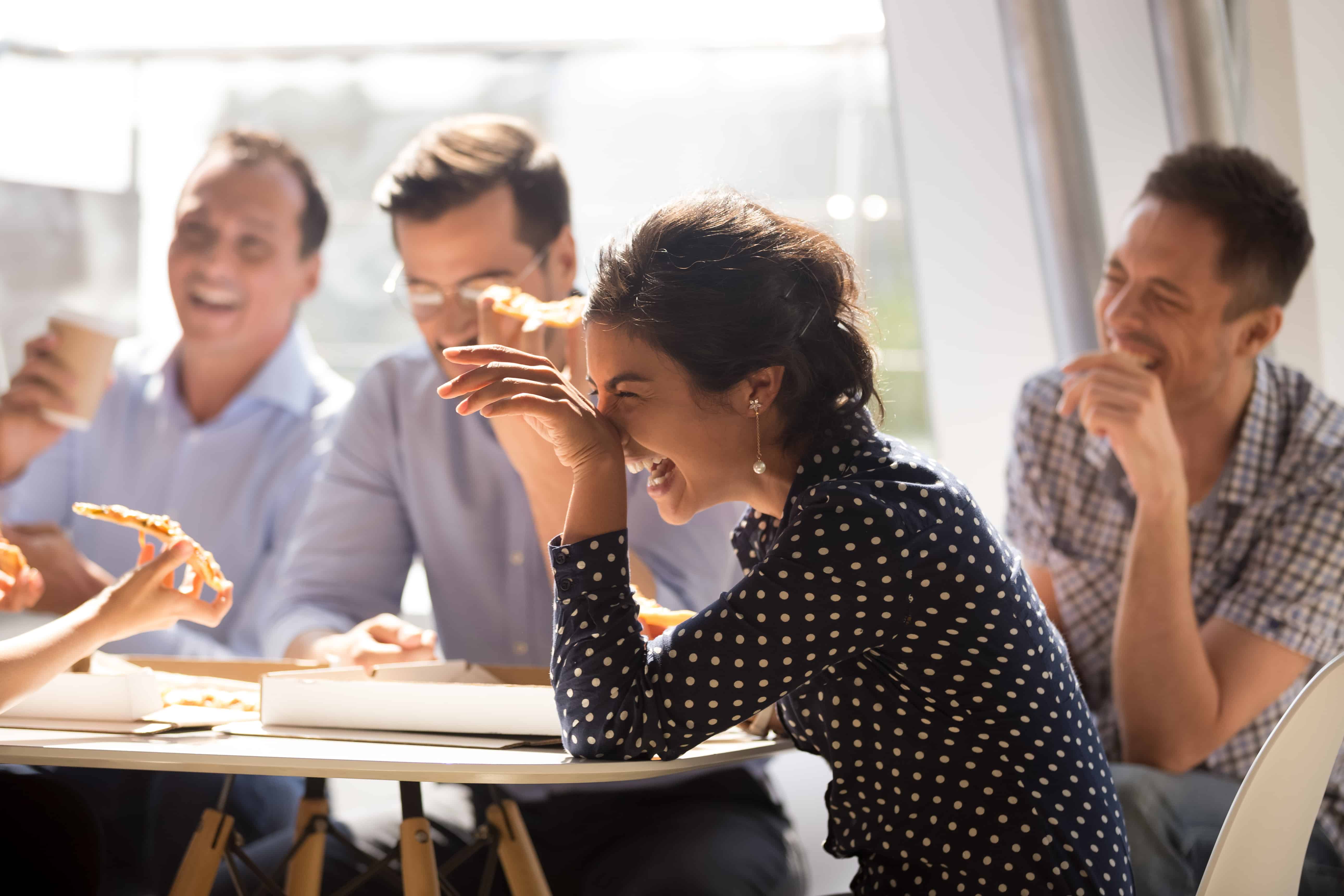 OPT Blog Image - Employees enjoying lunch together at the office