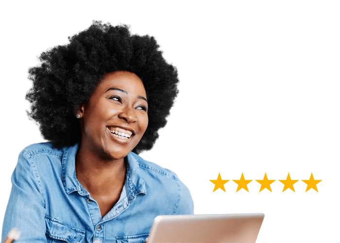 Happy woman using Giftbit on laptop