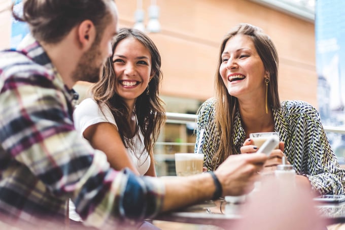 OPT Blog Image - Customers enjoying their beverages after using promo codes or gift cards